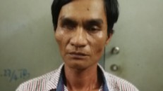 Nghi phạm Kim Thành Hưng bị công an bắt giữ.