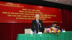 Tổng Bí thư, Chủ tịch nước Nguyễn Phú Trọng đến thăm, nói chuyện với cán bộ, nhân viên Đại sứ quán, đại diện cộng đồng, lưu học sinh và doanh ngiệp Việt Nam tại Lào. Ảnh: Trí Dũng/TTXVN