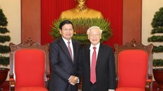 Tổng Bí thư, Chủ tịch nước Nguyễn Phú Trọng tiếp Thủ tướng Lào Thongloun Sisoulith. (Ảnh: Trí Dũng/TTXVN)