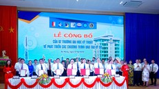 Lãnh đạo các trường ký kết hợp tác đào tạo. (Ảnh: PV/Vietnam+)
