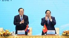 Hai Thủ tướng chủ trì Hội nghị hợp tác đầu tư Việt Nam - Lào