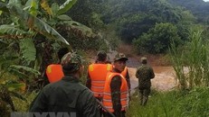 Lực lượng chức năng tổ chức tìm kiếm người bị mất tích. (Ảnh minh họa: TTXVN phát)