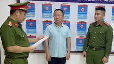 Công bố lệnh bắt tạm giam Quách Văn Hưng. (Ảnh: Bộ Công an)