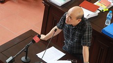 Ông Nguyễn Huy Quang tại phiên toà ngày 29/5. Ảnh: Phạm Dự.