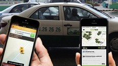 Grabcar được nhiều khách hàng ưa thích sử dụng do giá cước thấp hơn taxi truyền thống, nhiều khuyến mại. Ảnh minh họa: Xuân Hoa