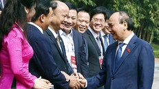 Chủ tịch nước Nguyễn Xuân Phúc với các đại biểu. (Ảnh: Thống Nhất/TTXVN)