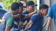 Ri Jong Chol (phải) bị cảnh sát Malaysia bắt ngày 17-2