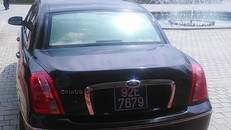 Chiếc xe ôtô hiệu Kia Opirus mang biển số 92E-7679 được lãnh đạo tỉnh Quảng Nam sử dụng, đã chạy 300.000km. Ảnh: Đ.T. 