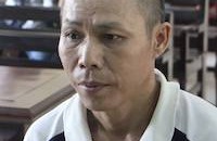 Vi Văn Nuôi tại toà.