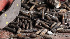 Đạn la liệt khắp làng sau trận nổ. Ảnh: Ngọc Thành