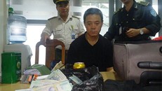 An ninh sân bay bắt giữ hành khách Trung Quốc cùng số tiền vụ trộm. 