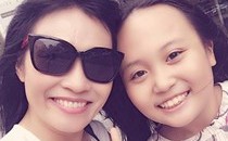 Hình ảnh cận mặt đầu tiên của con gái Phương Thanh được công bố sau 11 năm. Bé Gà chào đời năm 2005.