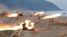 Triều Tiên bắn pháo trong một cuộc tập trận. Ảnh: KCNA