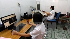 Khám siêu âm cho bệnh nhân theo quy trình dự án Xây dựng mô hình khám chữa bệnh và quản lý bệnh án điện tử. 