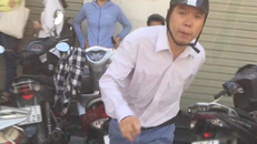 Gã kỹ sư hành hung phụ nữ tại ATM ra trình diện