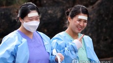 Các y tá tại Daegu vẫn lạc quan dù khối lượng công việc những ngày này hết sức nặng nhọc. Ảnh: Yonhap