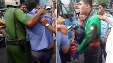 Va chạm, tài xế xe buýt cầm dao đâm tài xế grab nhập viện.