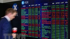 Bảng điện tử thông báo chỉ số chứng khoán tại sàn giao dịch ở Sydney, Australia. (Ảnh minh họa. THX/TTXVN)
