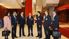 Đoàn đại biểu Đảng bộ tỉnh Ninh Thuận trước giờ làm việc sáng 29/1. Ảnh: TTXVN