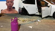 Đối tượng Nhiệm (ảnh nhỏ) cùng một trong những chiếc ô tô bị y đập phá. (Ảnh: Vietnamnet)