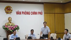 Ông Đỗ Ngọc Huỳnh (người đứng) trong một buổi làm việc tại Văn phòng Chính phủ. (Nguồn: VGP).