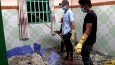 Thi thể 2 nạn nhân được đổ bê tông, giấu trong các thùng nhựa - Ảnh: Vietnamnet