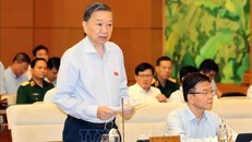 Bộ trưởng Bộ Công an Tô Lâm trình bày báo cáo về công tác phòng, chống tội phạm và vi phạm pháp luật. Ảnh: Trọng Đức/TTXVN