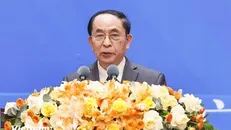 Ông Nguyễn Vinh Quang, Phó Chủ tịch Hội hữu nghị Việt-Trung trình bày tham luận tại Hội nghị. Ảnh: PV/Vietnam+