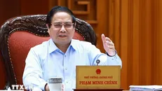 Thủ tướng Phạm Minh Chính chủ trì họp Thường trực Chính phủ với các bộ, ngành và Đoàn đàm phán Chính phủ về các vấn đề thương mại với Hoa Kỳ. Ảnh: Dương Giang/TTXVN.