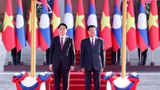 Chủ tịch nước Lương Cường và Tổng Bí thư, Chủ tịch nước Lào Thongloun Sisoulith. Ảnh: Lâm Khánh/TTXVN.