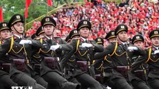 Duyệt đội ngũ chào mừng kỷ niệm 70 năm Ngày Giải phóng Hải Phòng. Ảnh: Hoàng Ngọc/TTXVN