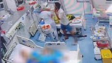 Hình ảnh người đàn ông đánh nữ điều dưỡng