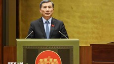 Chủ nhiệm Ủy ban Khoa học, Công nghệ và Môi trường của Quốc hội Lê Quang Huy trình bày Báo cáo giải trình. Ảnh: Minh Đức/TTXVN