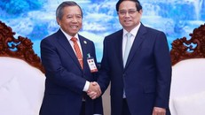 Thủ tướng Phạm Minh Chính tiếp Chủ tịch Hội Hữu nghị Lào-Việt Nam Boviengkham Vongdara. Ảnh: Dương Giang/TTXVN