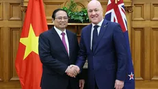 Thủ tướng Phạm Minh Chính với Thủ tướng New Zealand Christopher Luxon. Ảnh: Dương Giang/TTXVN