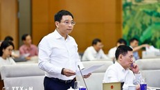 Bộ trưởng Bộ Tài chính Nguyễn Văn Thắng trình bày tóm tắt báo cáo. Ảnh: Doãn Tấn/TTXVN