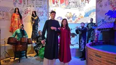 Màn trình diễn áo dài ngũ thân với các người mẫu là các nhân viên của Nhà Triển lãm Việt Nam và một số Nhà Triển lãm quốc gia tham gia EXPO 2025 như Mỹ, Thụy Sỹ… Ảnh: Cục Hợp tác Quốc tế