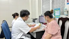 Nhiều phụ nữ mang thai được vận động, tuyên truyền đi kiểm tra sức khỏe định kỳ.