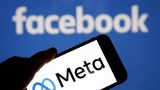 Biểu tượng Meta và Facebook trên màn hình điện thoại thông minh. Ảnh: Getty Images