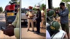 Lái xe có dấu hiệu vi phạm đang đọc các số điện thoại để không bị kiểm tra. Ảnh: Cắt từ clip