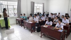 Lớp học ôn chuẩn bị cho kỳ thi tốt nghiệp THPT tại trường THPT Võ Văn Kiệt, thành phố Rạch Giá. Ảnh: Hồng Đạt/TTXVN.