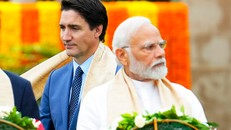 Thủ tướng Ấn Độ Narenda Modi và người đồng cấp Justin Trudeau. Ảnh: AP.