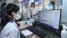 Người bệnh đến khám, chữa bệnh bằng căn cước công dân tại Trung tâm Y tế huyện Hữu Lũng, Lạng Sơn. Ảnh: Anh Tuấn/TTXVN.