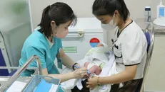 Đẩy mạnh tiêm phòng vaccine cho trẻ em tại Ninh Bình. Ảnh: Thùy Dung/TTXVN.