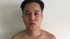 Nghi can Nguyễn Minh Cường khi ra đầu thú tại cơ quan công an.