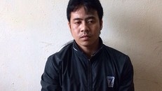 Hoàng Văn Túy tại cơ quan điều tra. Ảnh: H.H.