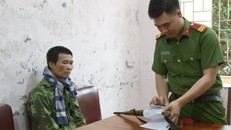 Ông Học Văn Đức tại cơ quan công an. Ảnh: Công an cung cấp.