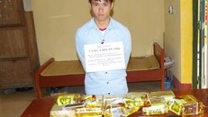 Đối tượng Dơ cùng tang vật tại cơ quan điều tra (ảnh: Bộ đội Biên phòng tỉnh Thanh Hóa) 