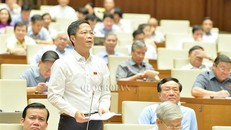 Bộ trưởng Công thương Trần Tuấn Anh. (Ảnh: Quốc hội) 