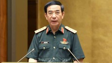 Đại tướng Phan Văn Giang, Bộ trưởng Bộ Quốc phòng trình bày Tờ trình dự án Luật Tham gia lực lượng gìn giữ hòa bình của Liên hợp quốc. Ảnh: Phương Hoa/TTXVN